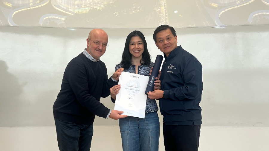 Adeline Lai (centre) has been coming back to attend the lifelong learning segments offered by the EMBA, learning something new at every session